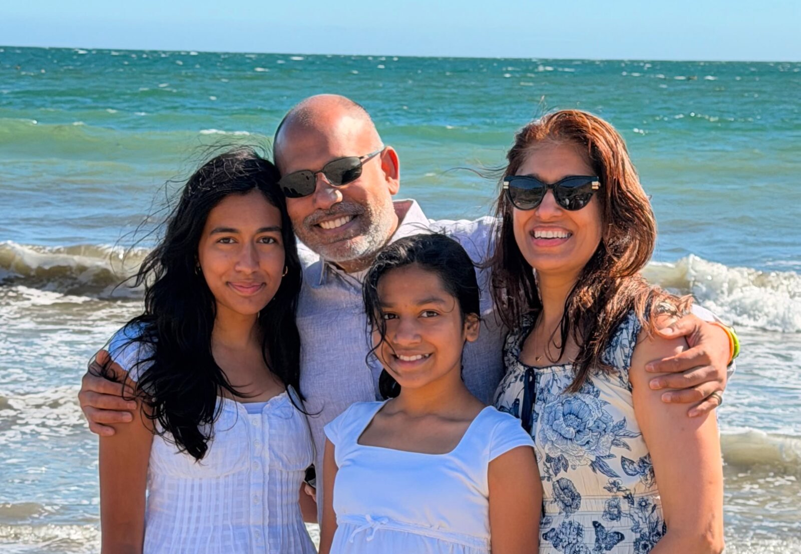 Sana, Veera, Sid, and Lopa together by the ocean